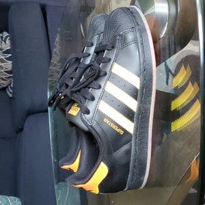 Adidas superstar black orange and yellow 3 stripe sneakers